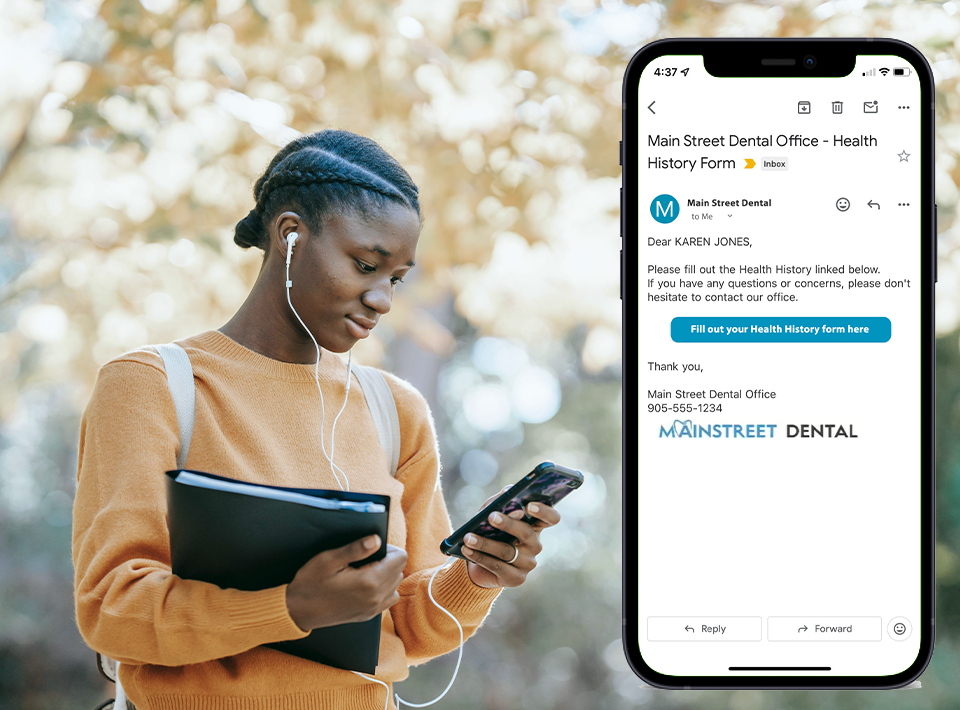 Person using their smartphone outside. They have earphones in. There is a sample of ABELDent's Health History email displayed on a phone beside the person.
